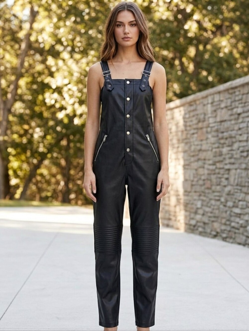 Black faux leather jumpsuit, buttoned. MANGO